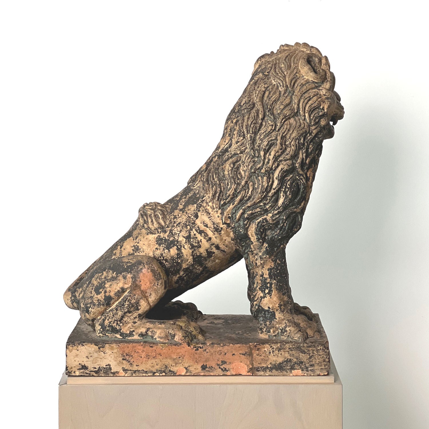 TERRACOTTA PAINTED SEATED LIONS