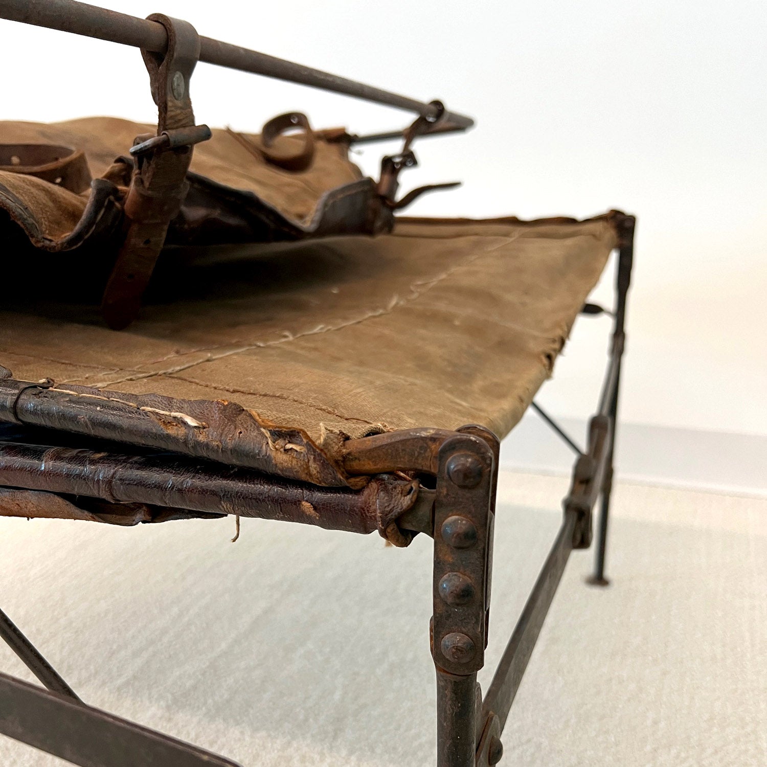 EARLY AMERICAN LEATHER FOLDING BUNK
