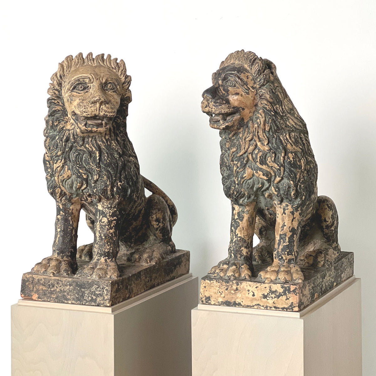 TERRACOTTA PAINTED SEATED LIONS