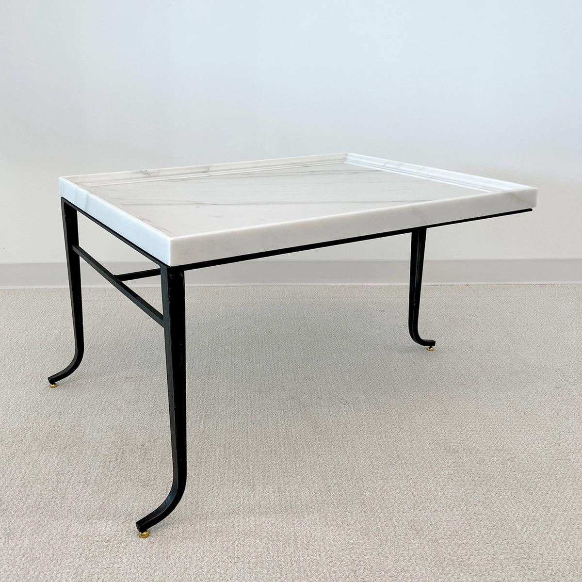 Three-Legged Coffee Table™
