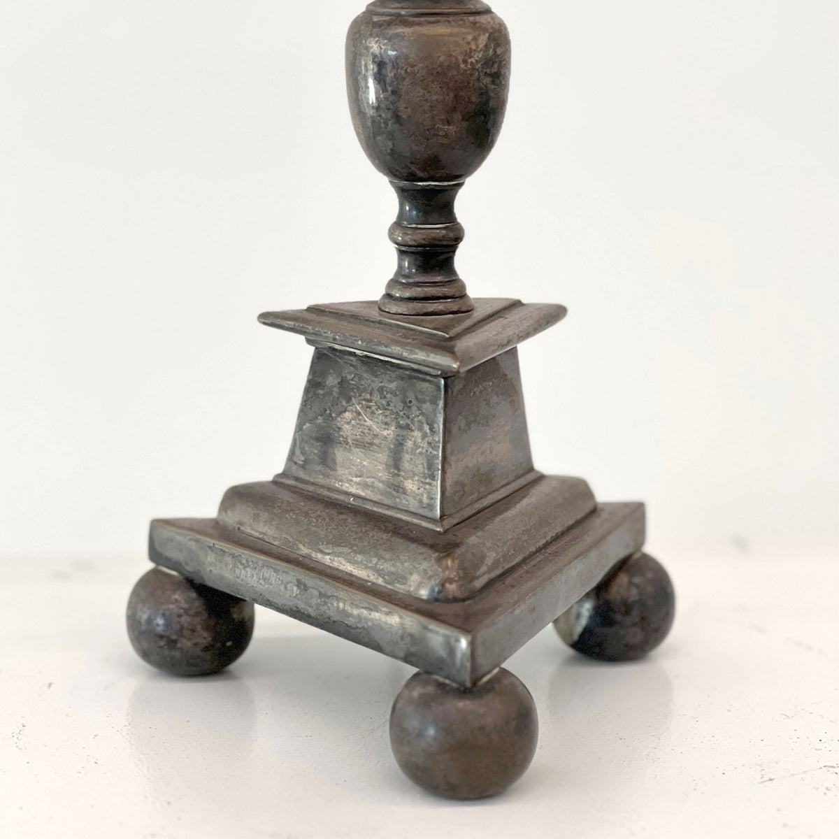 BALL-FOOTED TRIANGLE CANDLESTICK LAMP