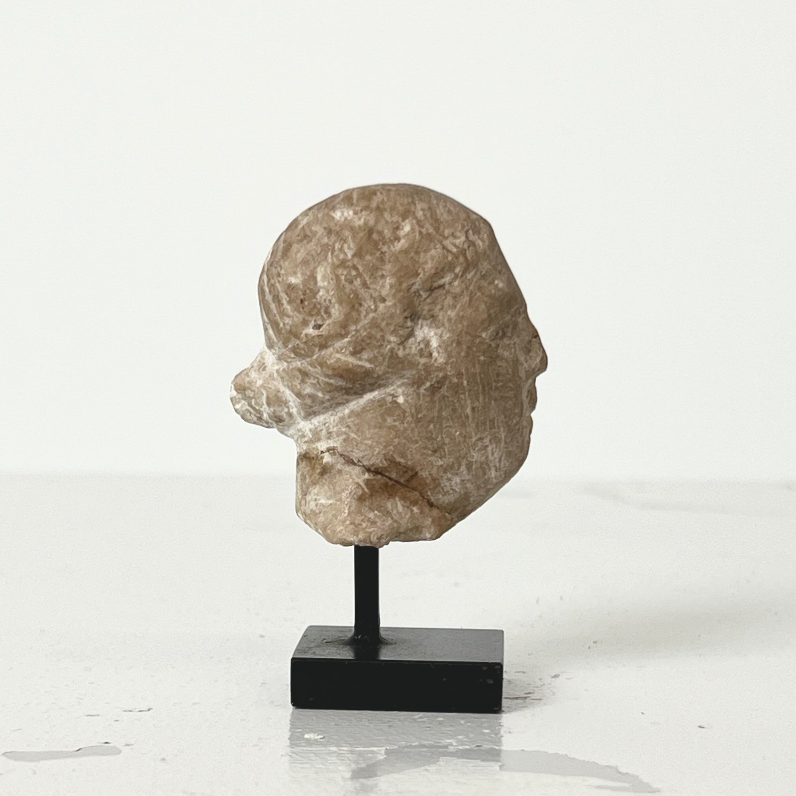 FEMALE STONE HEAD