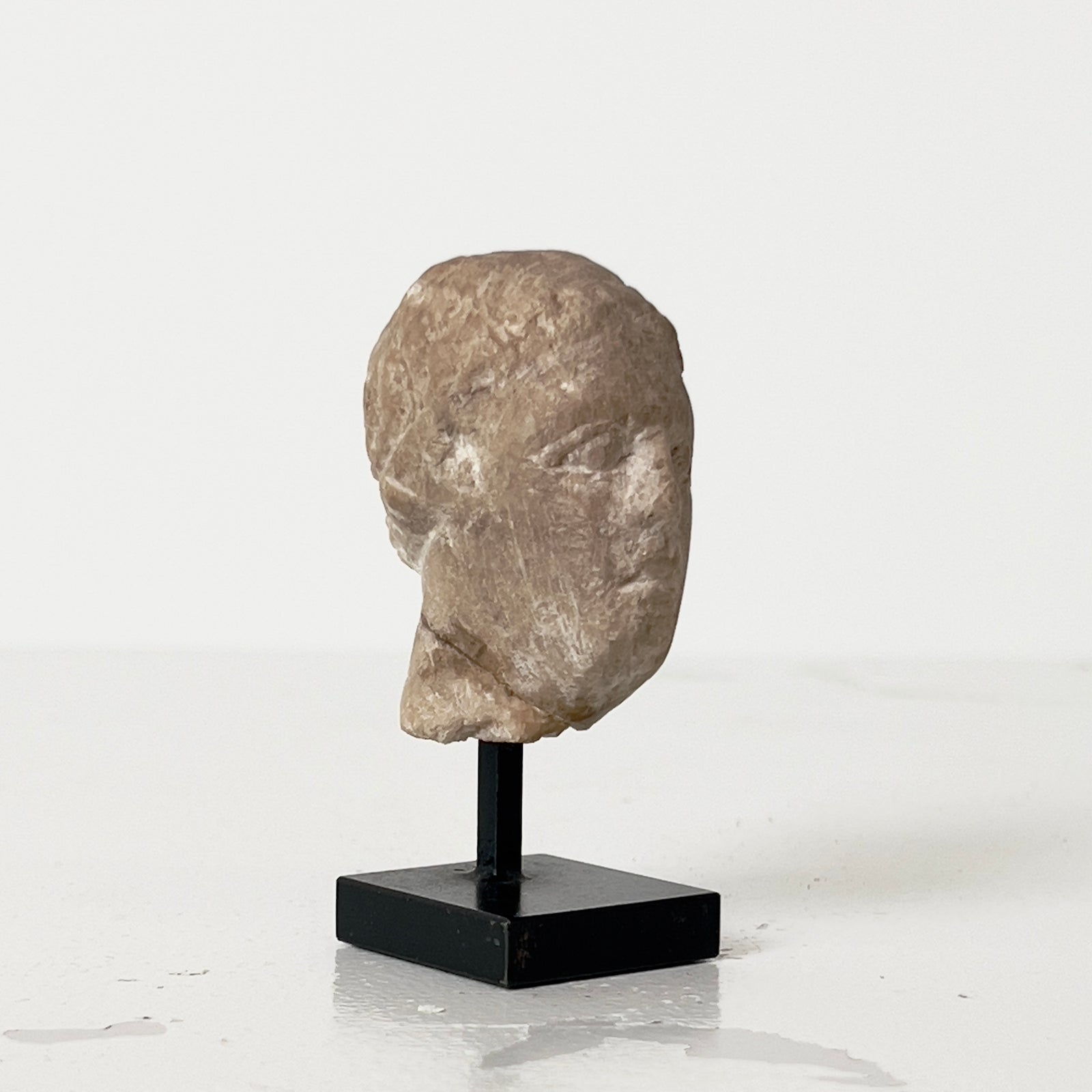 FEMALE STONE HEAD