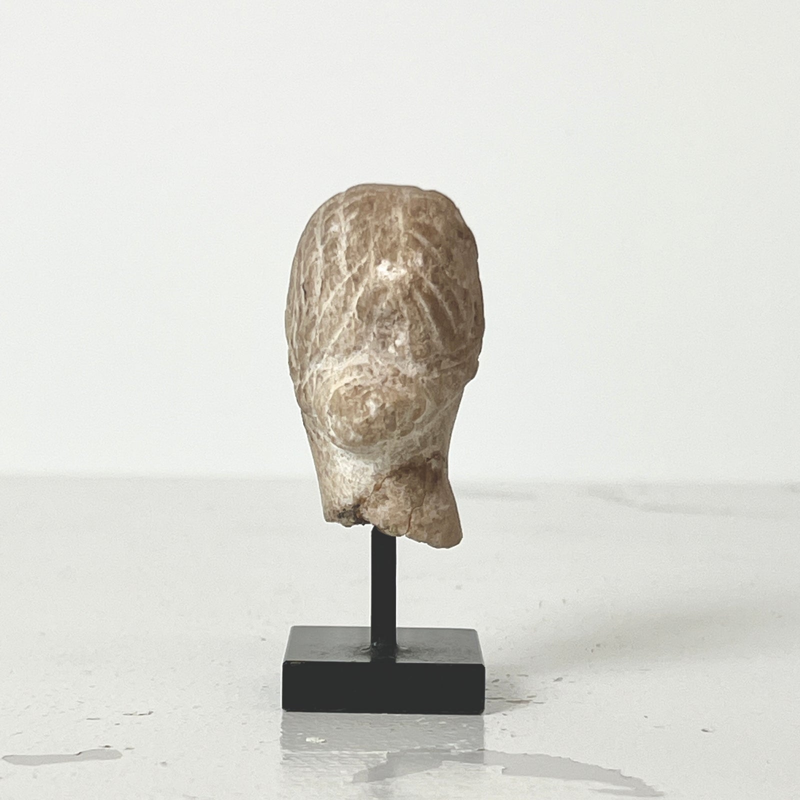 FEMALE STONE HEAD