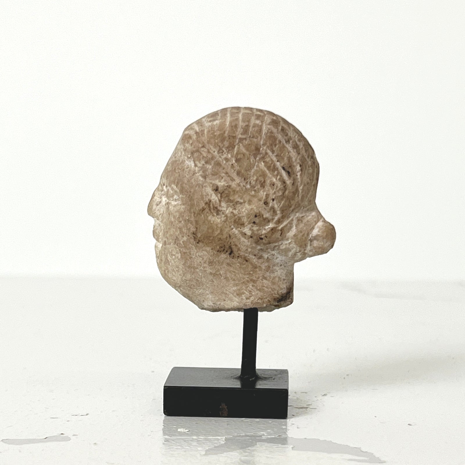FEMALE STONE HEAD